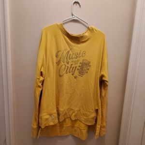 Bright yellow sweater